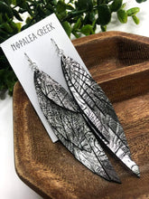 Load image into Gallery viewer, Stamped Fairy Feather Leather Earrings
